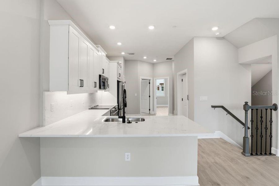 Furnished interior view inside a new home in Seahaven, Punta Gorda (Image 20). Furnished interior view inside a new home in Seahaven, Punta Gorda (Image 20).