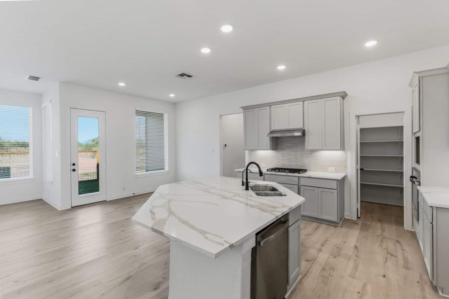 Representative furnished interior of a home built from the Shea by Chesmar Homes in The Crossvine – Garden Homes, Schertz (Image 6). Representative furnished interior of a home built from the Shea by Chesmar Homes in The Crossvine – Garden Homes, Schertz (Image 6).