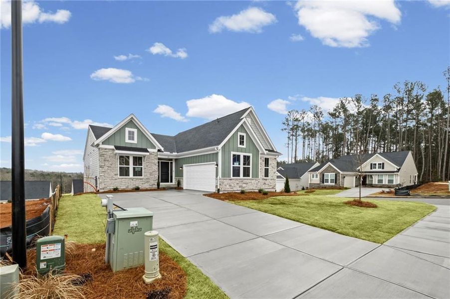 Front exterior of a new home in Easton Park, Dallas, GA, highlighting curb appeal (Image 19). Front exterior of a new home in Easton Park, Dallas, GA, highlighting curb appeal (Image 19).