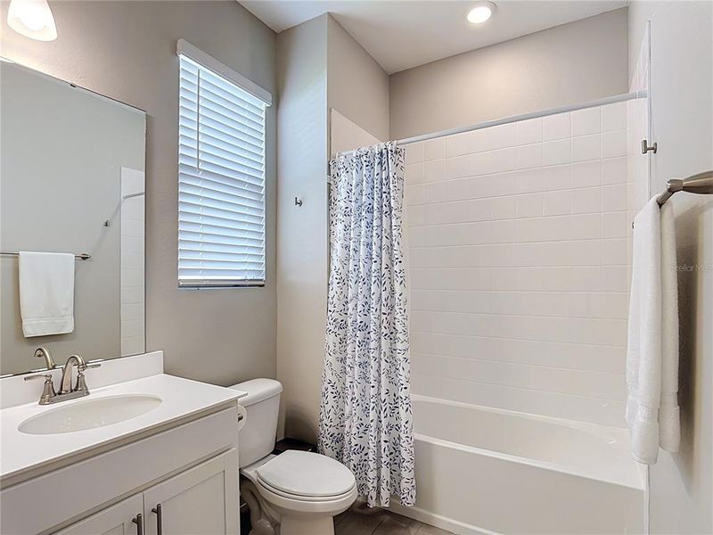 Furnished interior view inside a new home in Seasons at Big Sky, Kissimmee (Image 37).