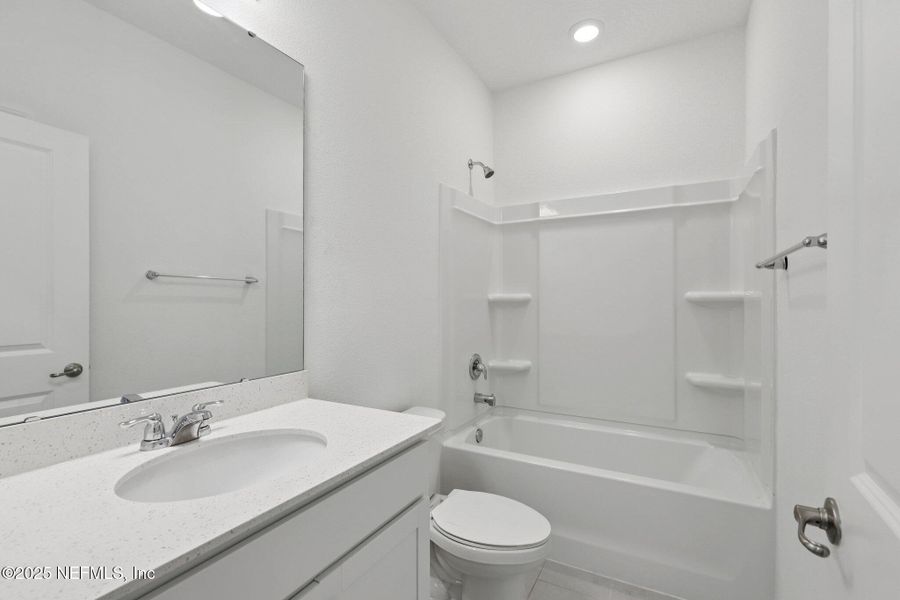 Furnished interior view inside a new home in Brandon Lakes at Silver Landing, St. Augustine (Image 13).