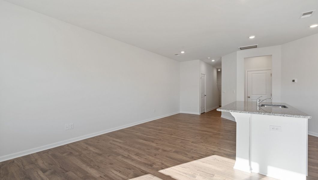 Spacious, unfurnished interior of a new home in Tanglewood Townes, Greenville (Image 13).