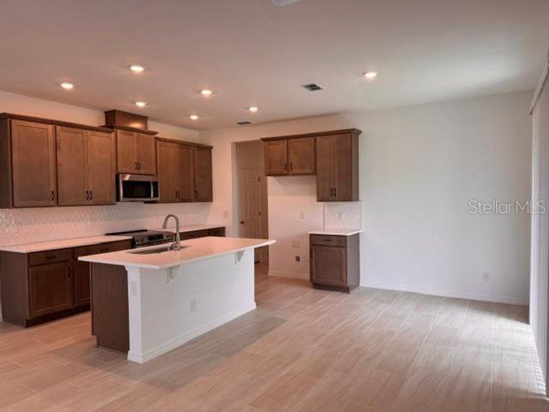 Furnished interior view inside a new home in Cypress Bluff, Groveland (Image 4).