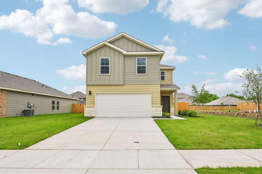 Front exterior of a new home in MiraVerde, Crowley, TX, highlighting curb appeal (Image 1). Front exterior of a new home in MiraVerde, Crowley, TX, highlighting curb appeal (Image 1).
