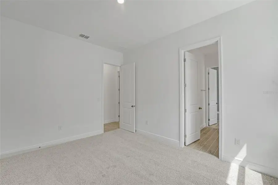 Spacious, unfurnished interior of a new home in Avalon Woods, Winter Garden (Image 35).