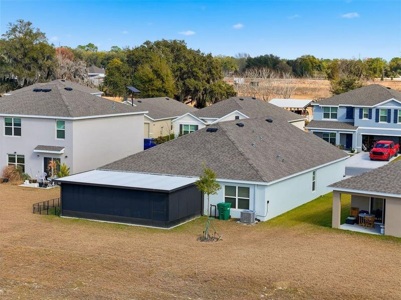 Exterior details and patio area of a home in Twisted Oaks, Wildwood (Image 25).