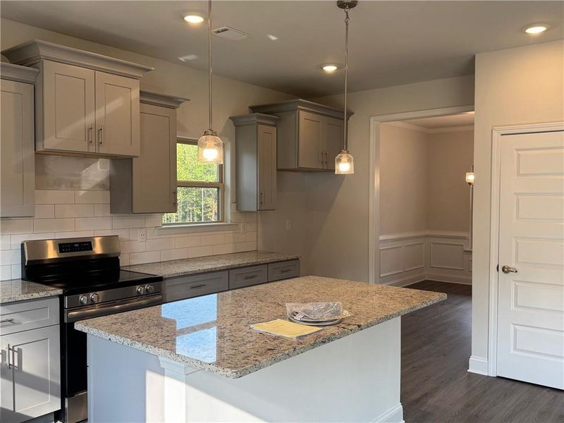 Furnished interior view inside a new home in Magnolia Villas, Cornelia (Image 5).