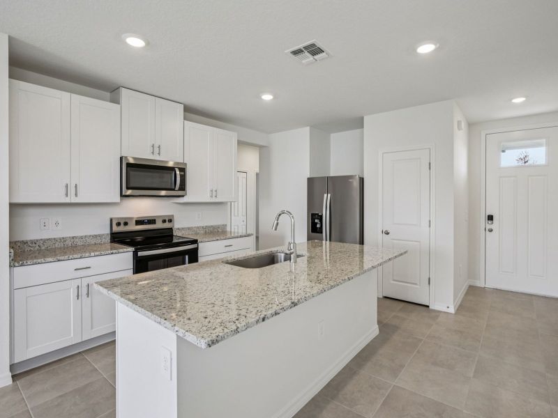 Furnished interior view inside a new home in Leyland Preserve - Premier Series, Brooksville (Image 3).