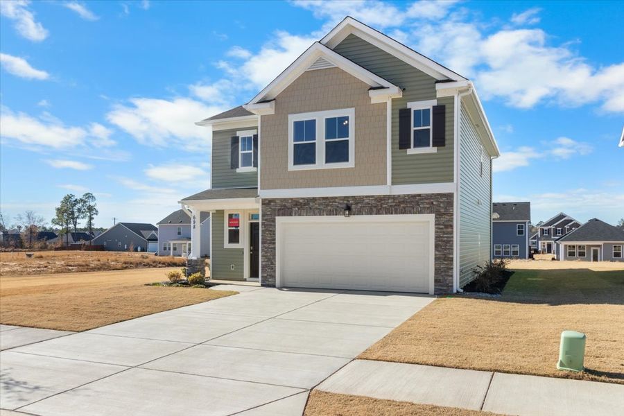 Front exterior of a new home in Windsor, North Augusta, SC, highlighting curb appeal (Image 18).