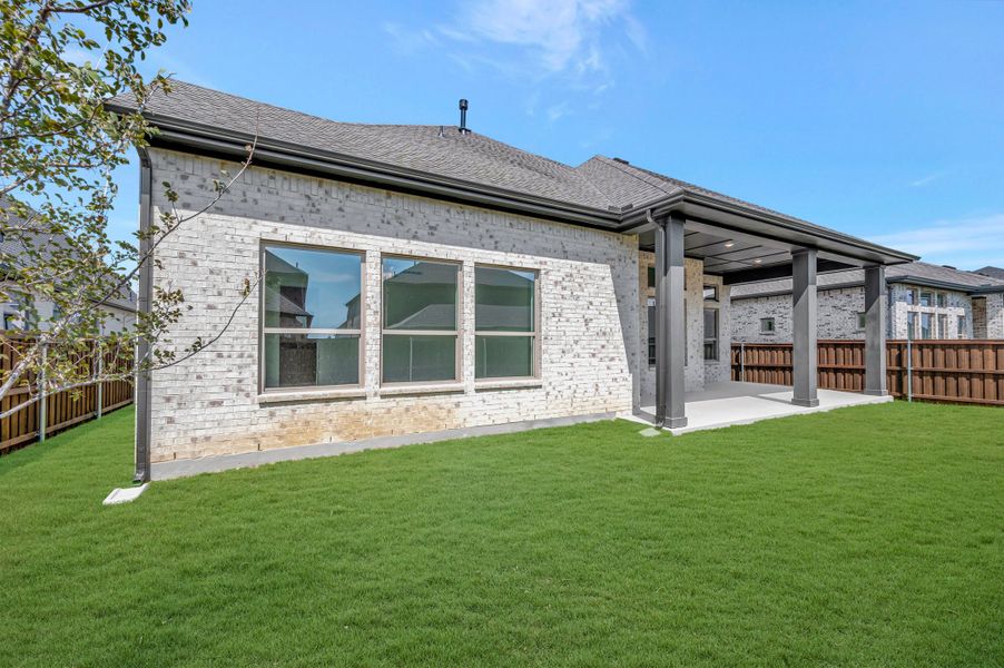 Exterior details and patio area of a home in The Ridge at Northlake, Northlake (Image 3).