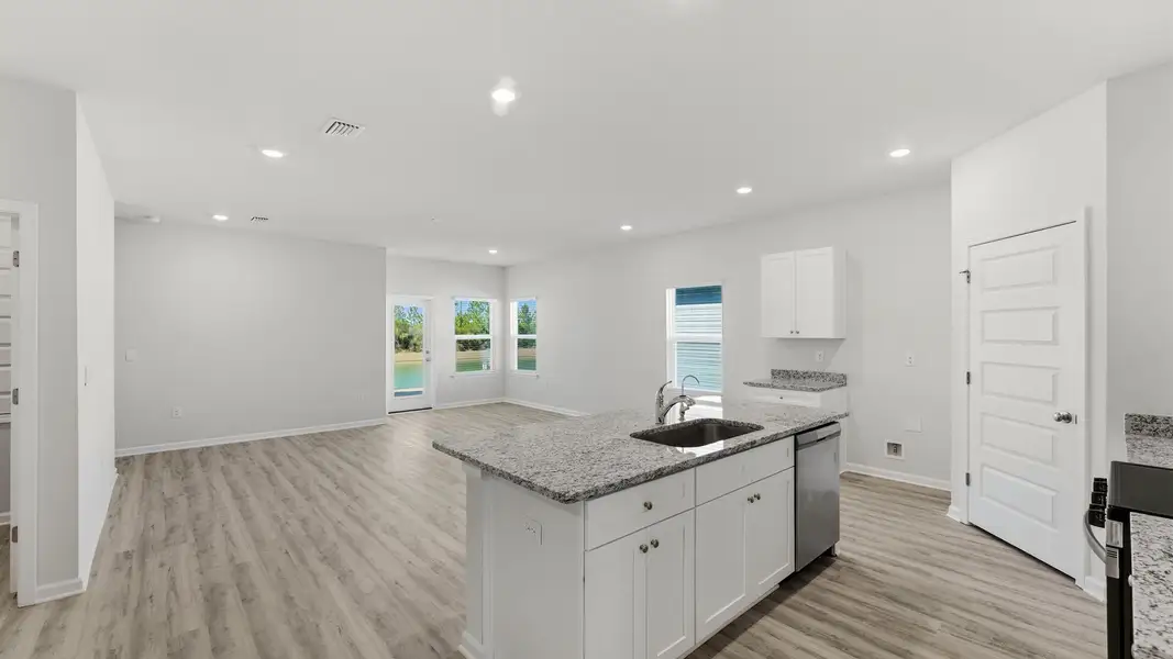 Furnished interior view inside a new home in Hodges Bayou Plantation, Panama City (Image 3).