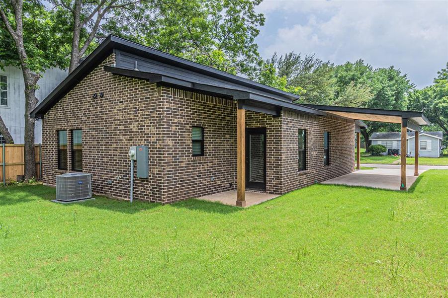 Front exterior of a new home in , Denison, TX, highlighting curb appeal (Image 2). Front exterior of a new home in , Denison, TX, highlighting curb appeal (Image 2).