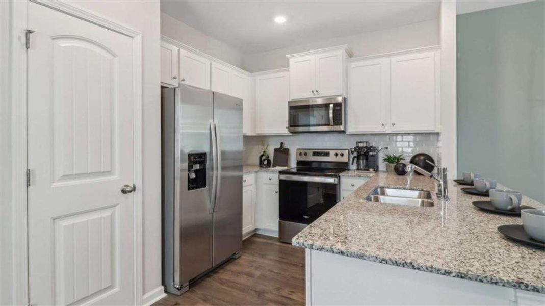 Furnished interior view inside a new home in Wellington Park, Lithonia (Image 39).