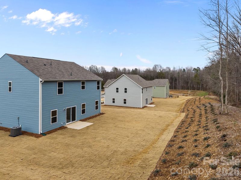 Exterior details and patio area of a home in Fisher Springs, Kannapolis (Image 4).