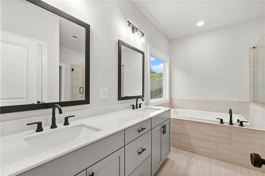Furnished interior view inside a new home in Palisades Single Family, Cumming (Image 9). Furnished interior view inside a new home in Palisades Single Family, Cumming (Image 9).