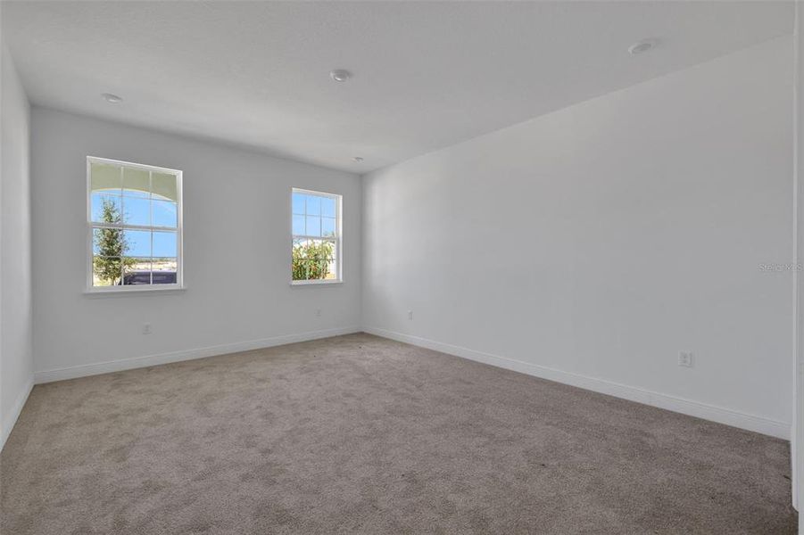 Spacious, unfurnished interior of a new home in Serenade at Ovation, Winter Garden (Image 25). Spacious, unfurnished interior of a new home in Serenade at Ovation, Winter Garden (Image 25).