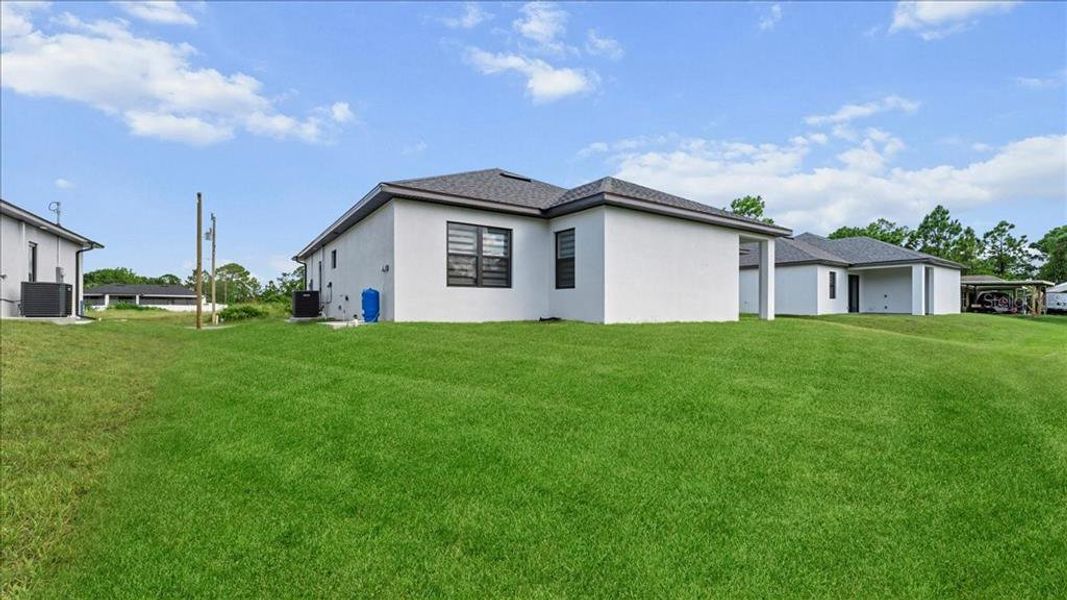 Exterior details and patio area of a home in , Lehigh Acres (Image 31).