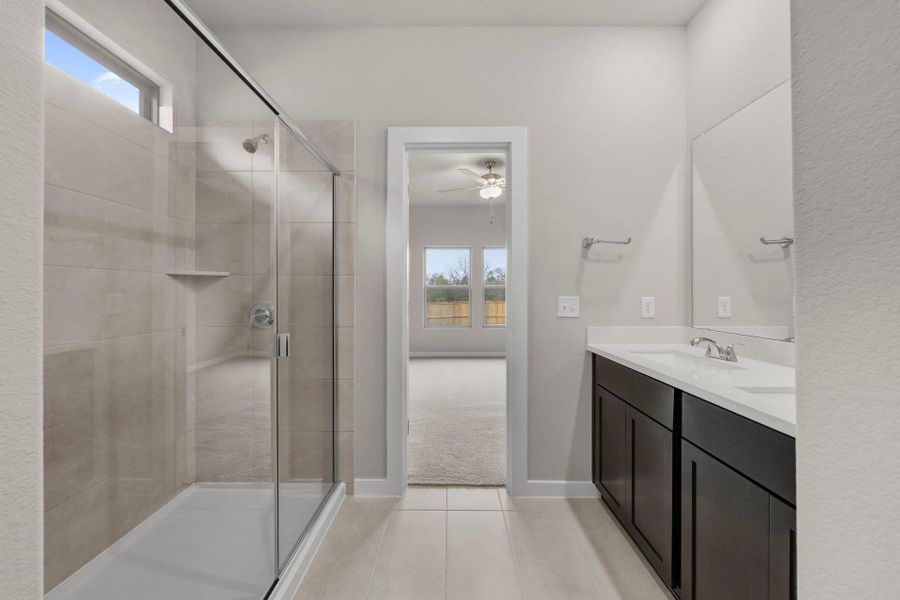 Primary Bath retreat with dual vanities & walk-in shower