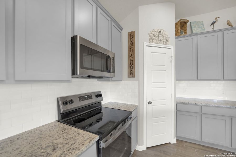 Furnished interior view inside a new home in Chaparral Ranch, Floresville (Image 12).