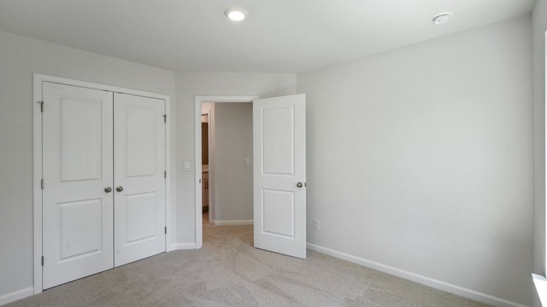 Spacious, unfurnished interior of a new home in Copper Run South, Durham (Image 19).