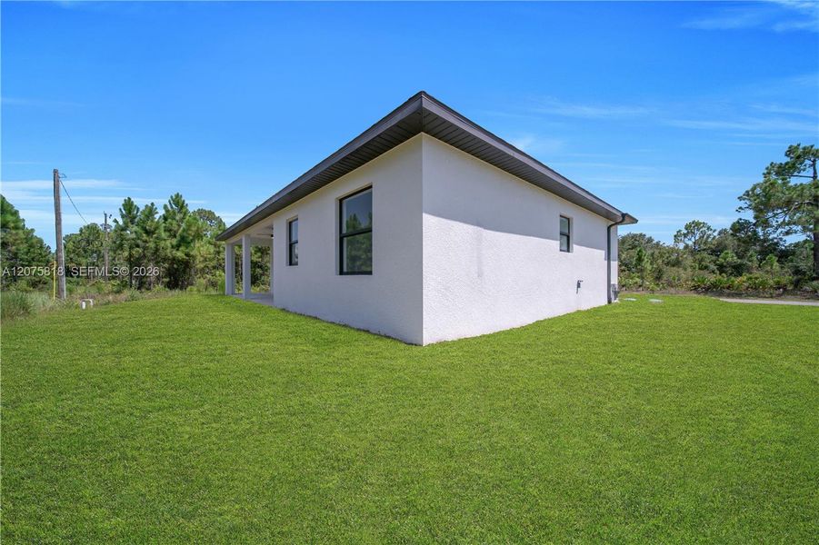 Exterior details and patio area of a home in , Lehigh Acres (Image 22).