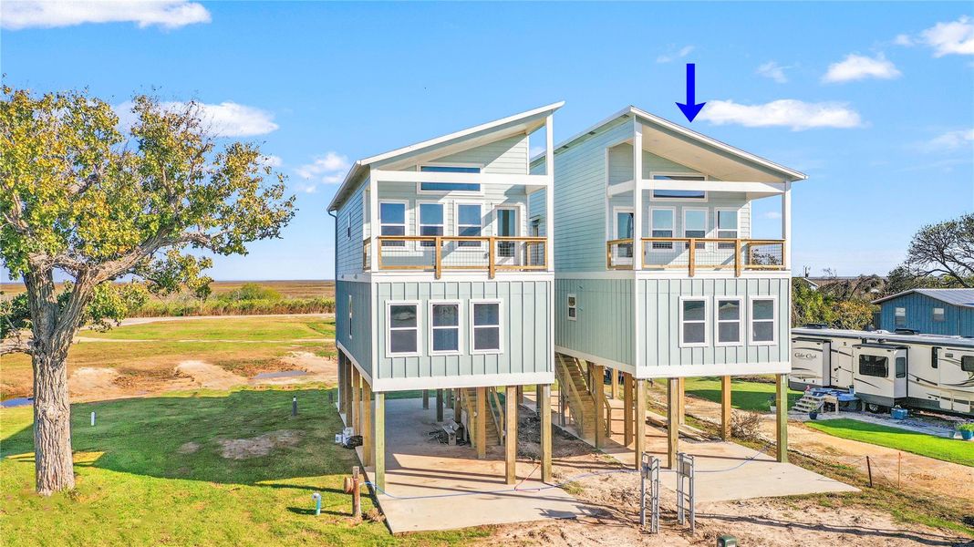 Front exterior of a new home in , Matagorda, TX, highlighting curb appeal (Image 2). Front exterior of a new home in , Matagorda, TX, highlighting curb appeal (Image 2).