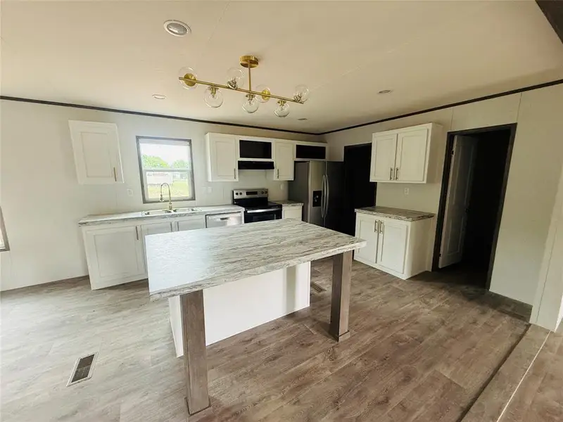 Furnished interior view inside a new home in , Granbury (Image 4).