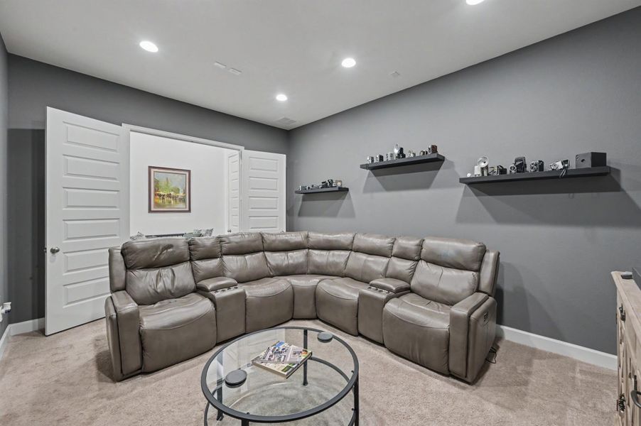 The media package includes recessed lighting and is wired for surround sound and a projector. The shelving will stay! The media package includes recessed lighting and is wired for surround sound and a projector. The shelving will stay!