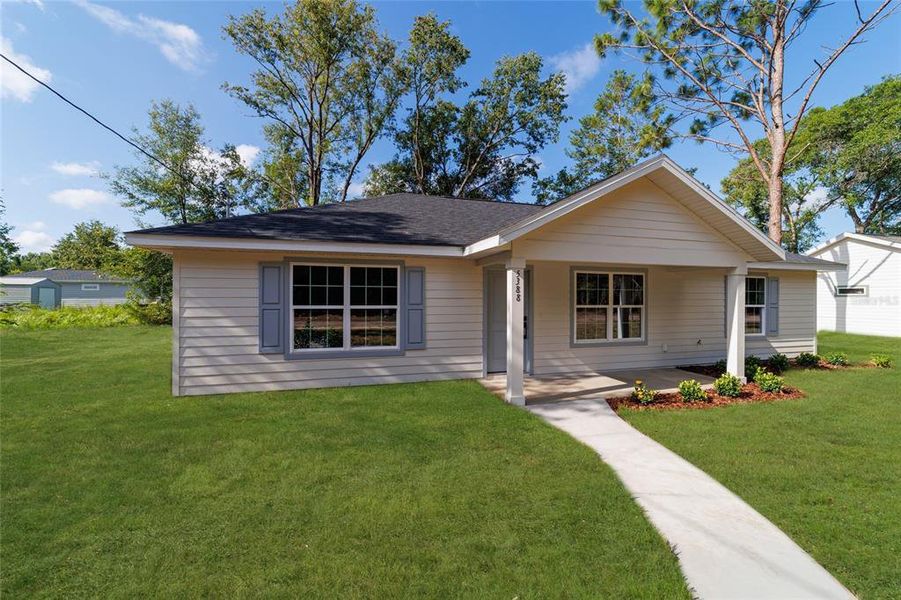 Front exterior of a new home in , Ocala, FL, highlighting curb appeal (Image 19).