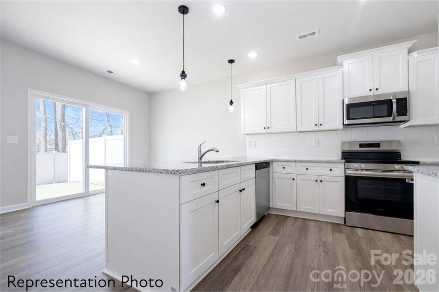 Furnished interior view inside a new home in , Charlotte (Image 9).