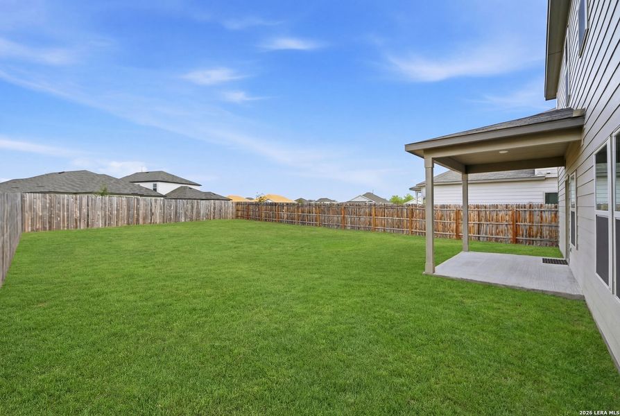 Exterior details and patio area of a home in Winding Brook, San Antonio (Image 24).
