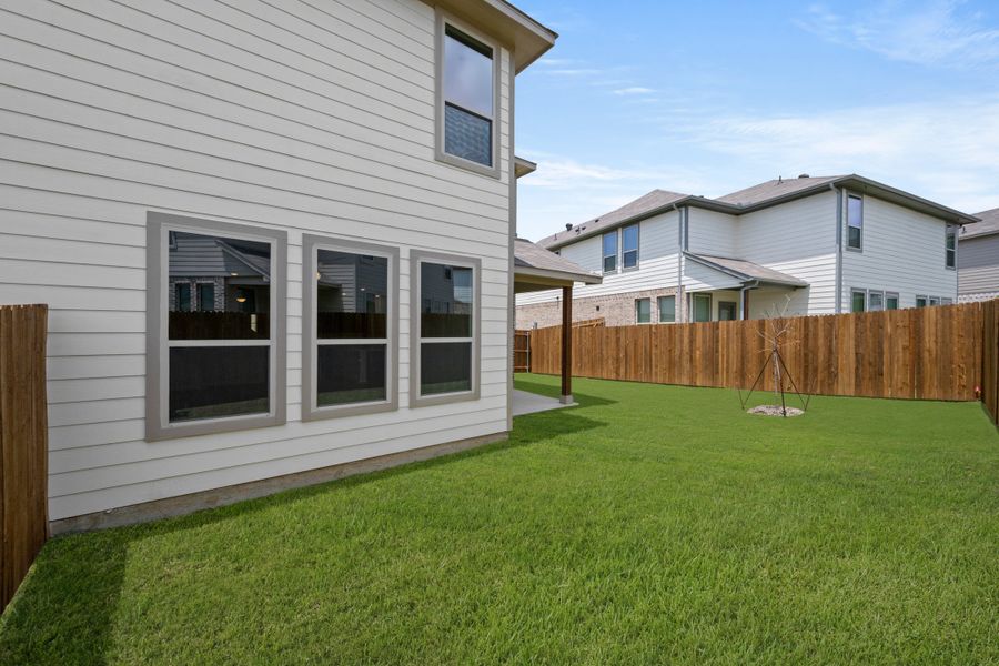 Front exterior of a new home in Eagle Cove, Denton, TX, highlighting curb appeal (Image 20).