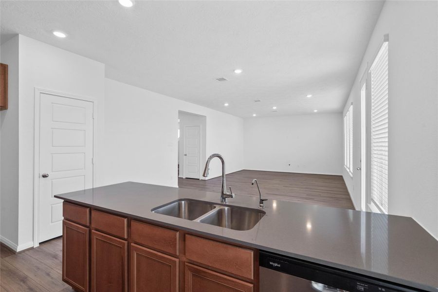 Commanding view from the kitchen to the open concept Great Room.