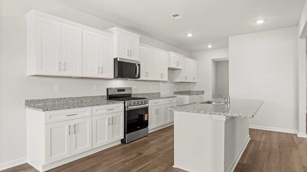 Representative furnished interior of a home built from the Halton by D.R. Horton in Southwind Village, Evans (Image 7).
