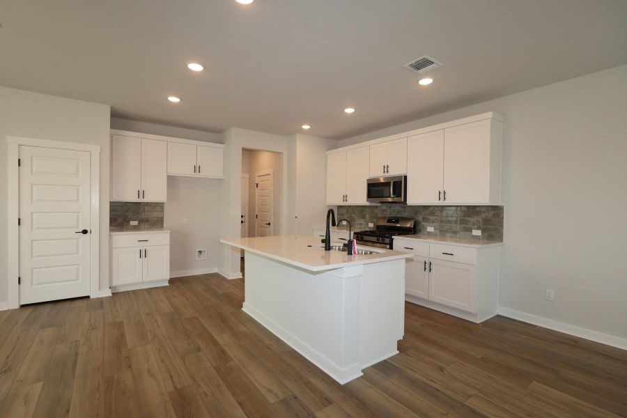 Furnished interior view inside a new home in Park Central, Georgetown (Image 4).