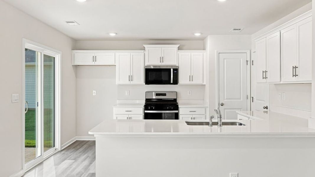 Furnished interior view inside a new home in Harper Ridge, Roebuck (Image 7).