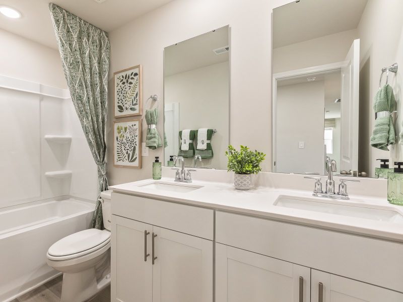 Secondary bathroom in the Chatham floorplan at a Meritage Homes community in Angier, NC.