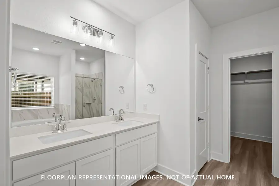 Furnished interior view inside a new home in Sorella, Tomball (Image 10).