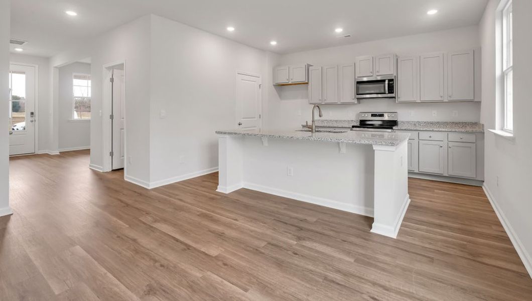 Representative unfurnished interior of a home built from the GLYNN by D.R. Horton in Grayson Park, Leland (Image 22).