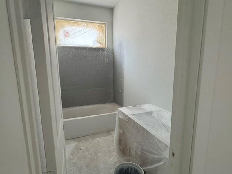 Ready for your personal touches, this bathroom features a bathtub and ample space for customization. Ready for your personal touches, this bathroom features a bathtub and ample space for customization.