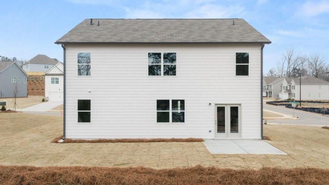 Exterior details and patio area of a home in Thompson Ridge, Dallas (Image 3).