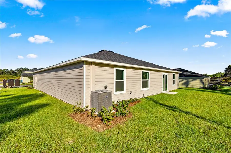 Exterior details and patio area of a home in Marion Ranch, Ocala (Image 3).