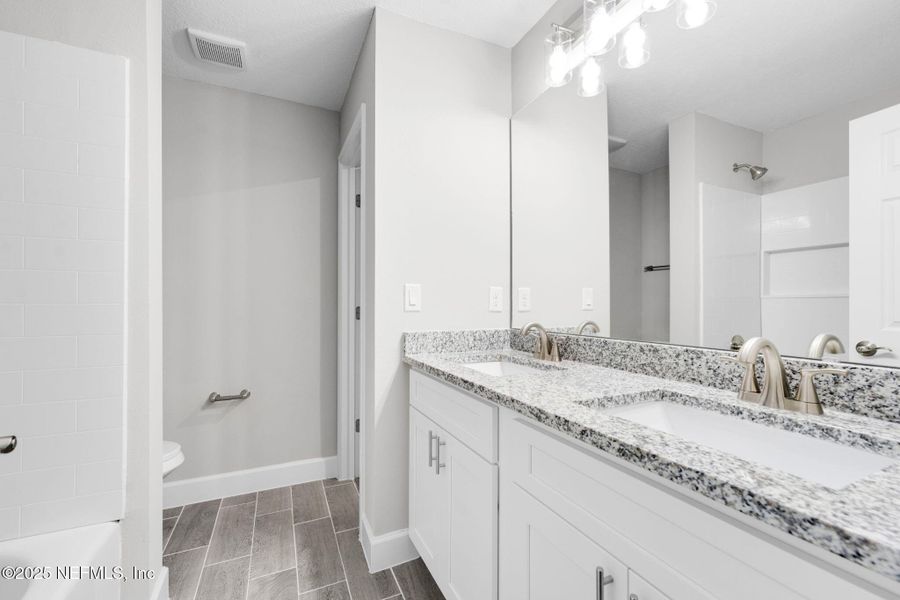 Furnished interior view inside a new home in , Jacksonville (Image 8). Furnished interior view inside a new home in , Jacksonville (Image 8).