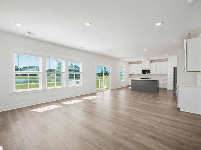 Spacious, unfurnished interior of a new home in The Coves at Lakes of Cane Bay II, Summerville (Image 20).