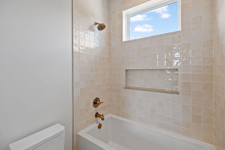 Full bath with shower combination and toilet Full bath with shower combination and toilet