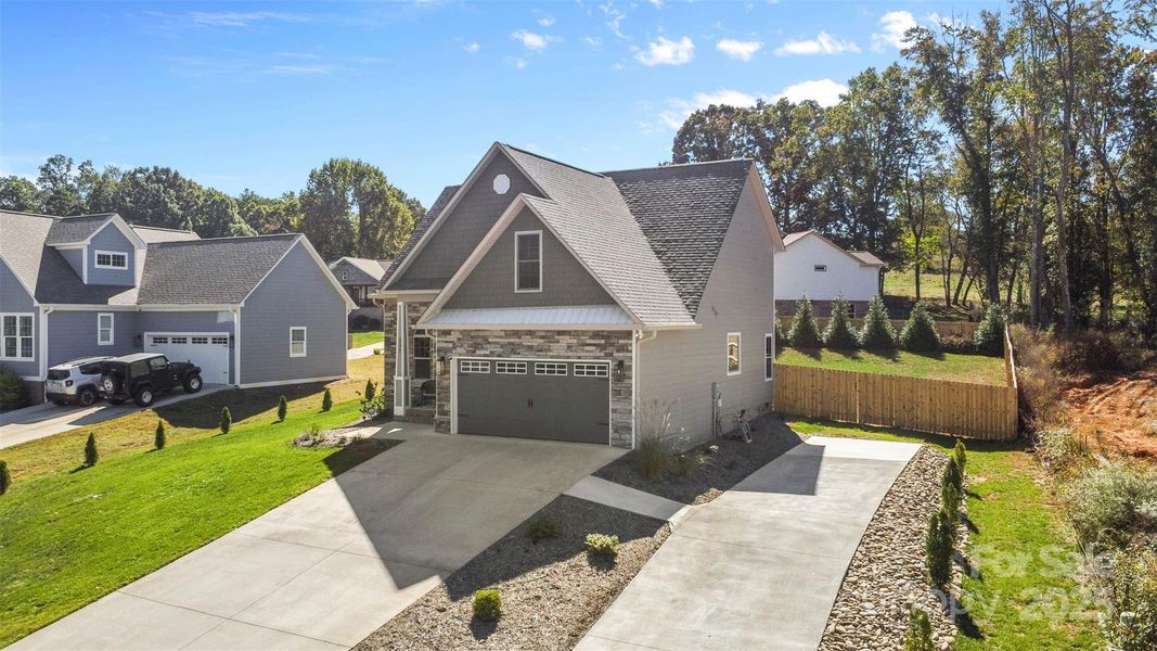 Front exterior of a new home in , Hudson, NC, highlighting curb appeal (Image 2).