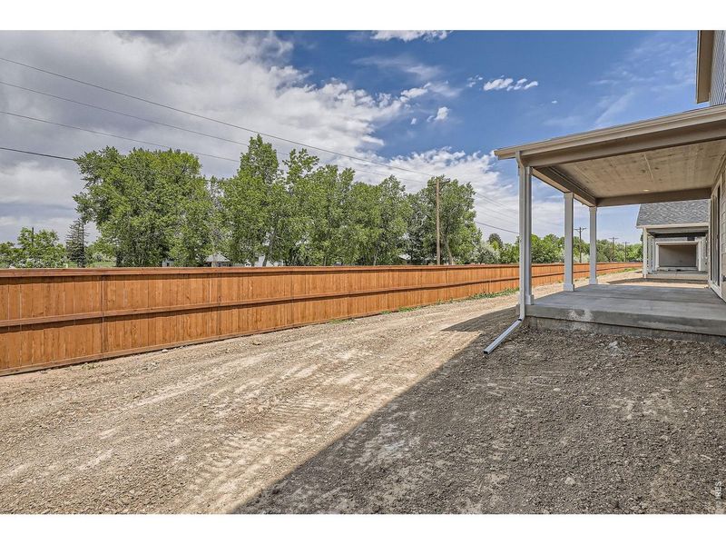 Exterior details and patio area of a home in Farmstead, Berthoud (Image 4).