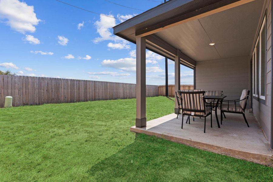 Exterior details and patio area of a home in Emberly, Beasley (Image 24).