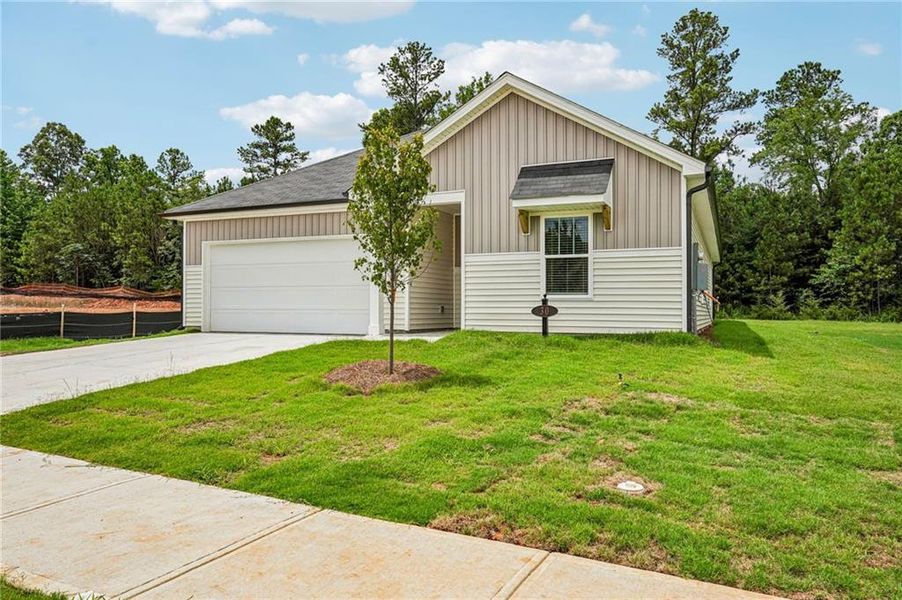 Front exterior of a new home in Manning Mill, Adairsville, GA, highlighting curb appeal (Image 2). Front exterior of a new home in Manning Mill, Adairsville, GA, highlighting curb appeal (Image 2).