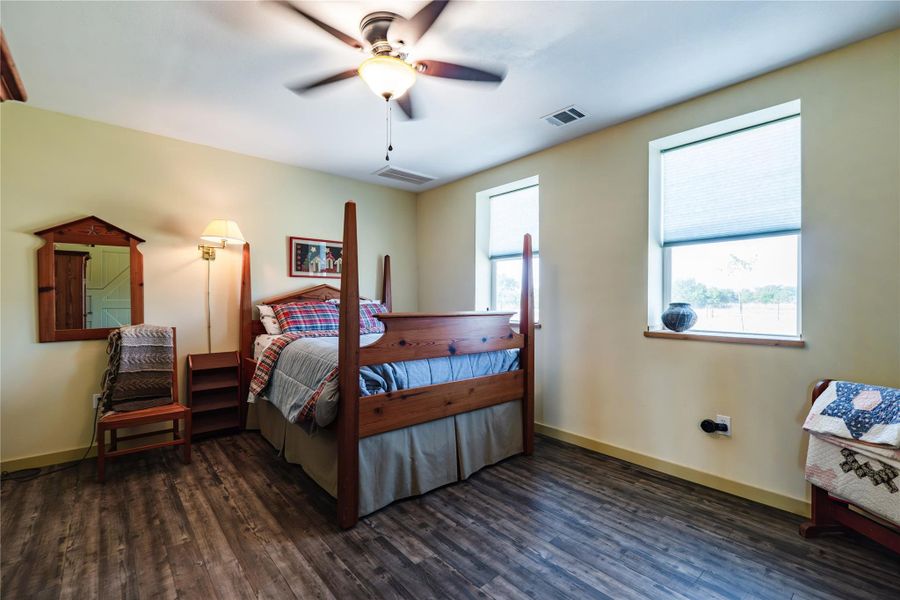 Guest bedroom enjoys LVP flooring and ensuite bathroom Guest bedroom enjoys LVP flooring and ensuite bathroom